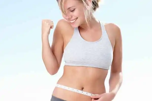 woman happy after fat reduction treatment Swindon