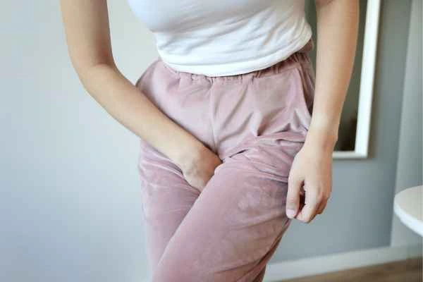 older woman running to the toilet because of urinary incontinence Swindon